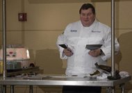 Attorney and chef Jeffrey S. McDonald demonstrates how to make decorative chocolate accents for desserts at the America’s Baking and Sweets Show this month at the Renaissance Schaumburg Convention Center Hotel in Schaumburg. 