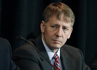 In this Oct. 7, 2015, file photo, Consumer Financial Protection Bureau Director Richard Cordray listens to a speaker during a hearing in Denver. The CFPB has decided to broadly ban the use of so-called arbitration clauses from financial products. Cordray said mandatory arbitration clauses are a way for banks and other financial companies to “sidestep the legal system.” Consumer advocates have been pushing for years for stricter federal regulation of these types of clauses. But the move is likely to face pushback from the banking industry and the Republican-controlled Congress. 