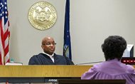 City Court Judge Craig Hannah presides at Opiate Crisis Intervention Court in Buffalo, N.Y. The first such program in the country puts users under faster, stricter supervision than ordinary drug courts, all with the goal of keeping them alive. 
