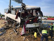 Authorities investigate the scene of a charter bus crash on northbound Highway 99 between Atwater and Livingston, Calif., on Aug. 20. U.S. officials are abandoning plans to require sleep apnea screening for truck drivers and train engineers, a decision that safety experts say puts millions of lives at risk. 